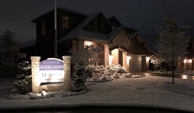 Castlegate II Model Home with snow in texas
