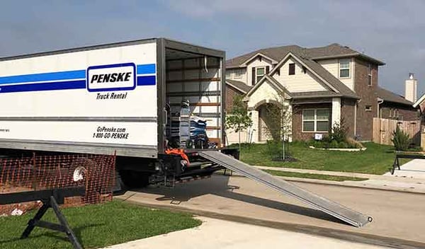 unloading furniture from moving truck