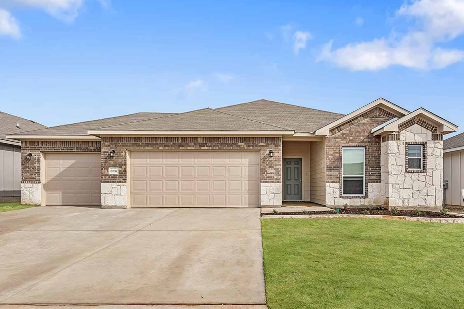 Omega Builders Model Home Stock Image https://www.omegabuilders.com/hubfs/content/photos/mesa-ridge/8708-glade-fultonIII-200/8708-glade-dr-01.jpg