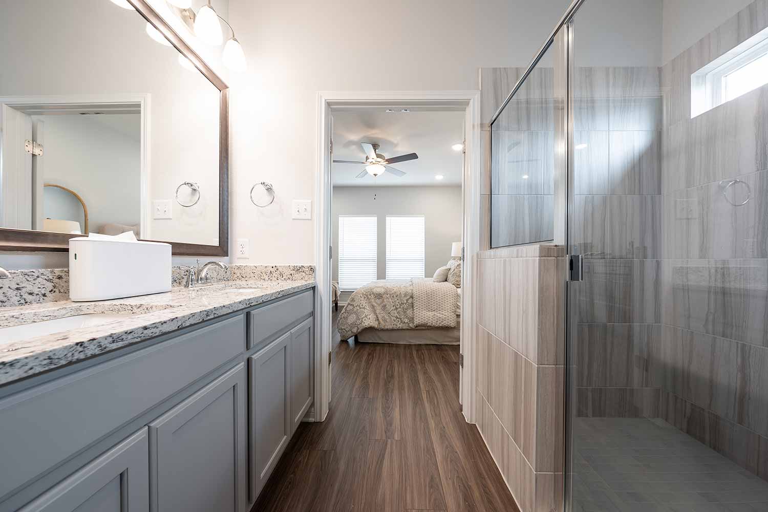 Omega Builders Model Home Stock Image https://www.omegabuilders.com/hubfs/content/photos/oak-ridge-model-home/808-coriander-033.jpg