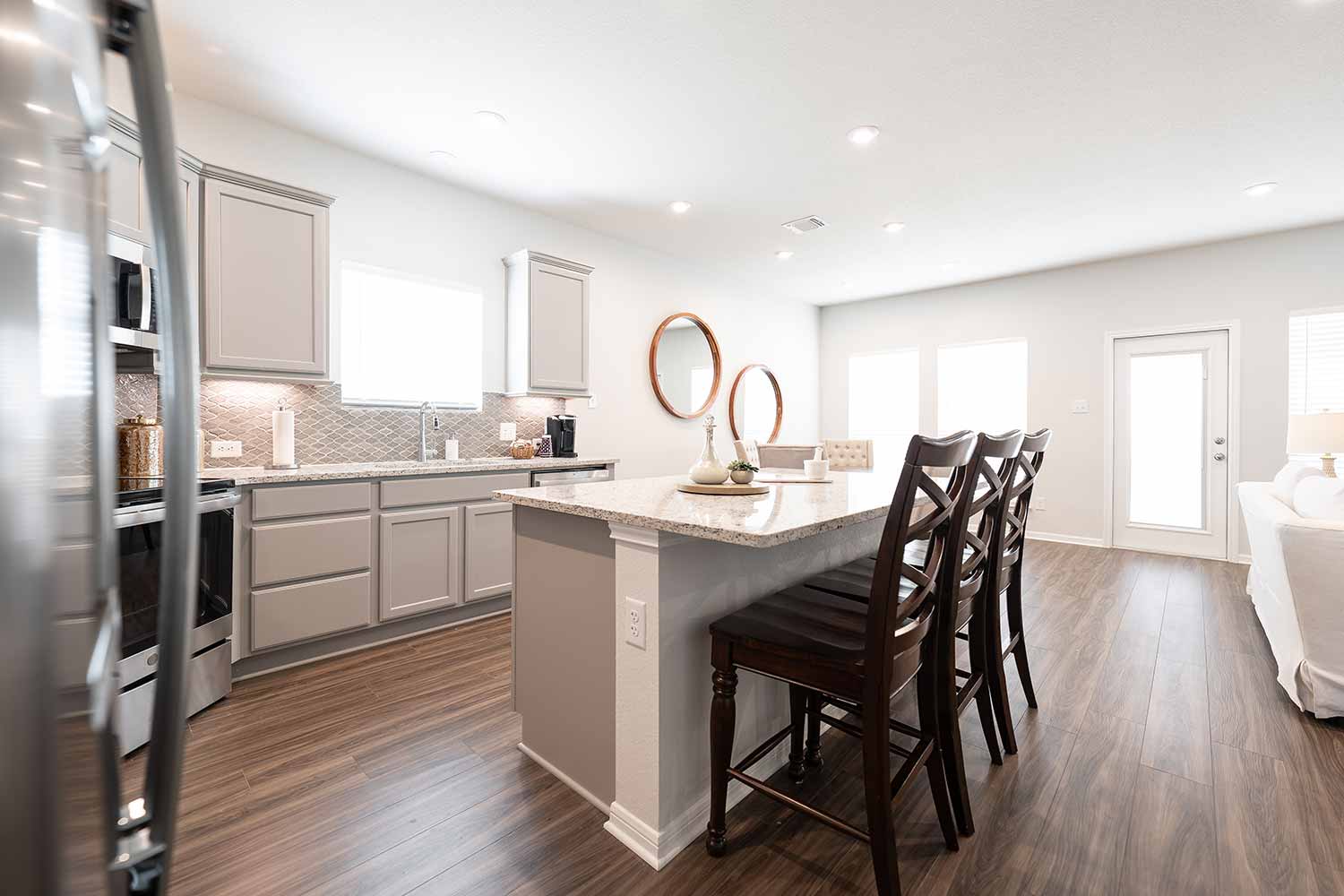 Omega Builders Model Home Stock Image https://www.omegabuilders.com/hubfs/content/photos/oak-ridge-model-home/808-coriander-040.jpg