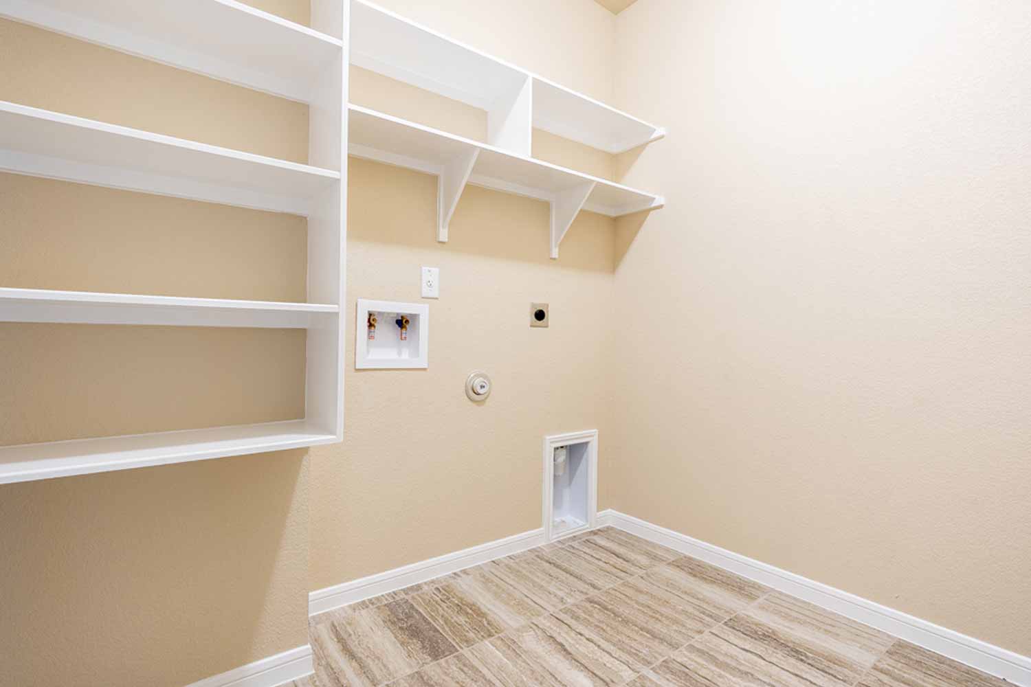 Omega Builders Model Home Stock Image https://www.omegabuilders.com/hubfs/content/photos/reserve-at-pea-ridge/7417-hickman/7417-hickman-011.jpg